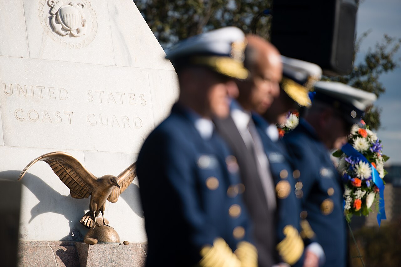 Members of the community gathered at a veterans memorial